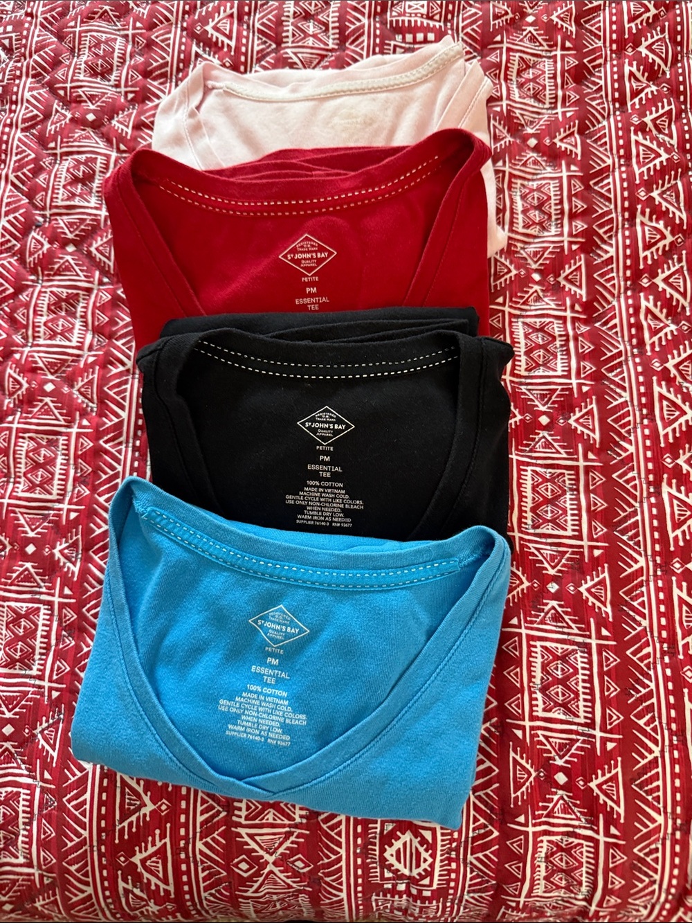 St John’s Bay V Neck, size PM in black, blue, red and turquoise.